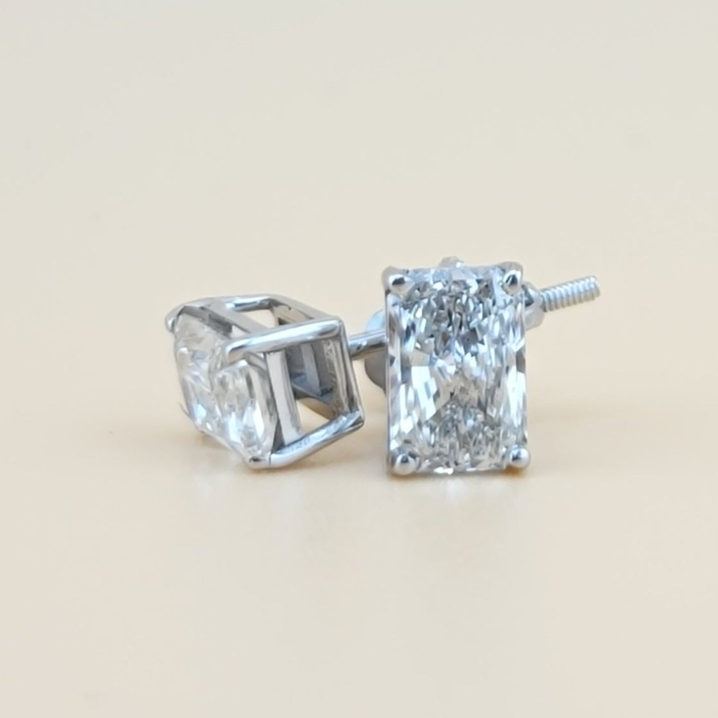 1.93 carats lab grown diamond radiant cut solitaire earrings in 14k gold