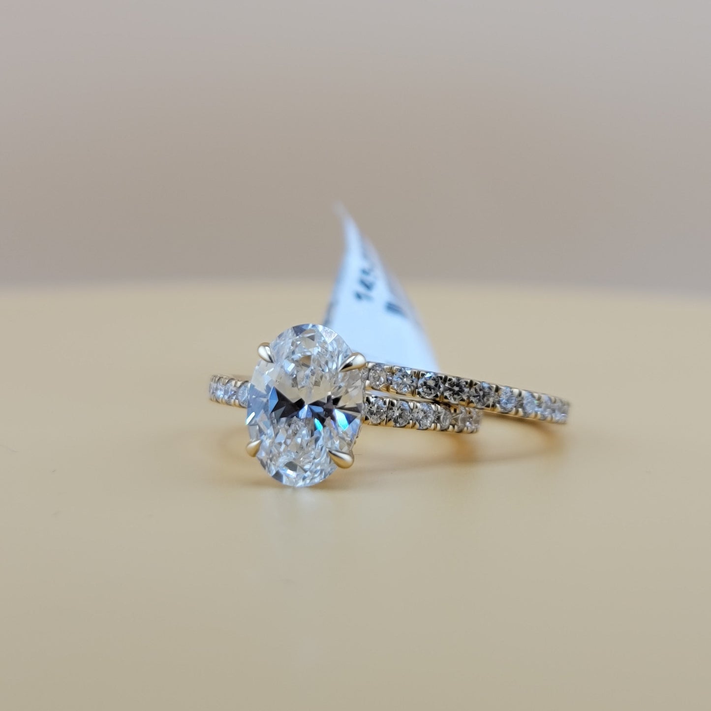 4.45 Carats Diamonds 3.06 Carats Oval Center 14 Karat Yellow Gold Engagement Ring