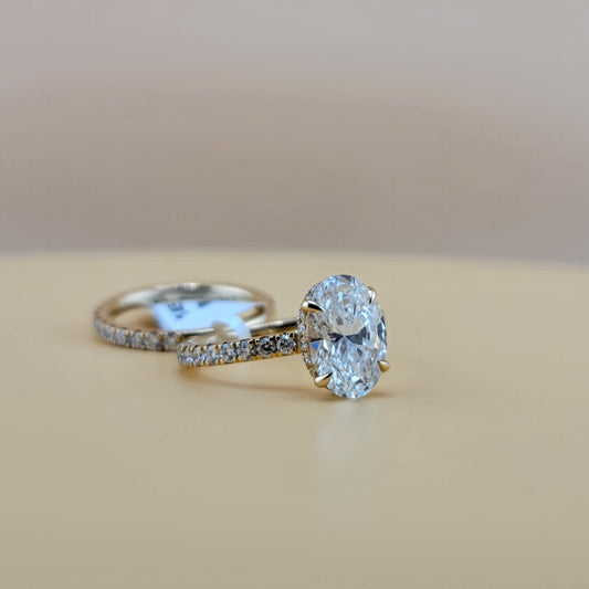 4.45 Carats Diamonds 3.06 Carats Oval Center 14 Karat Yellow Gold Engagement Ring