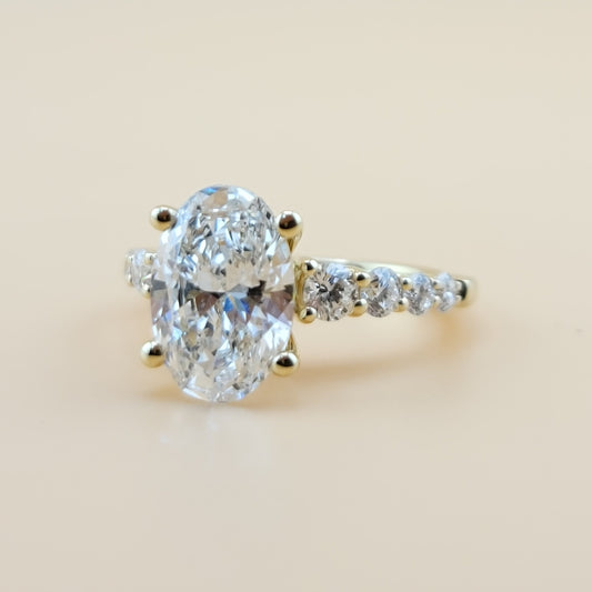 3.06 carats Oval cut center 3.80 carats diamonds 14k gold Engagement Ring