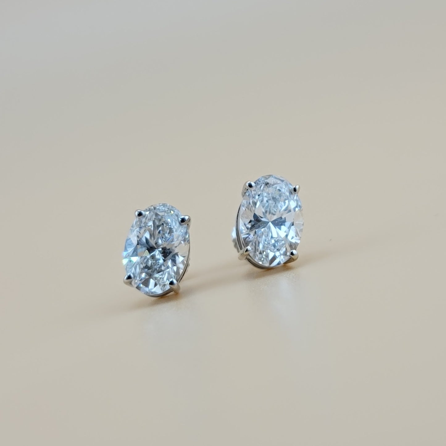 3 carats lab grown diamond Oval cut solitaire earrings in 14k gold