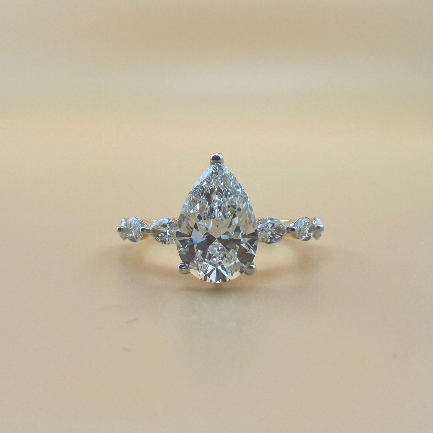 2.06 carats pear center 2.84 carats diamonds 14k gold Engagement Ring