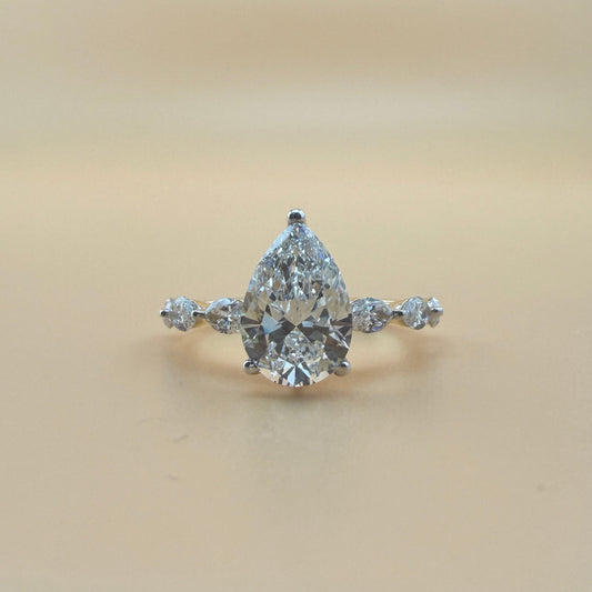 2.06 carats pear center 2.84 carats diamonds 14k gold Engagement Ring