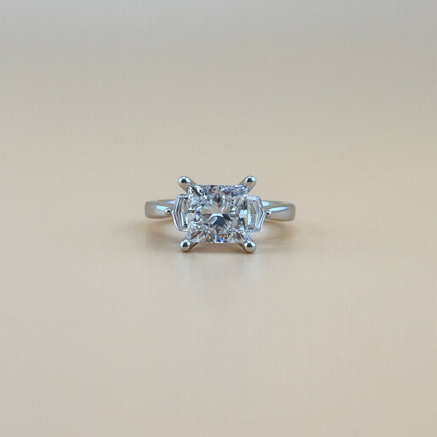 14K White Gold 3.0 CT Princess Cut Three-Stone Ring with 0.5 CT Pentagonal Side Stones – Total 3.5 CTW