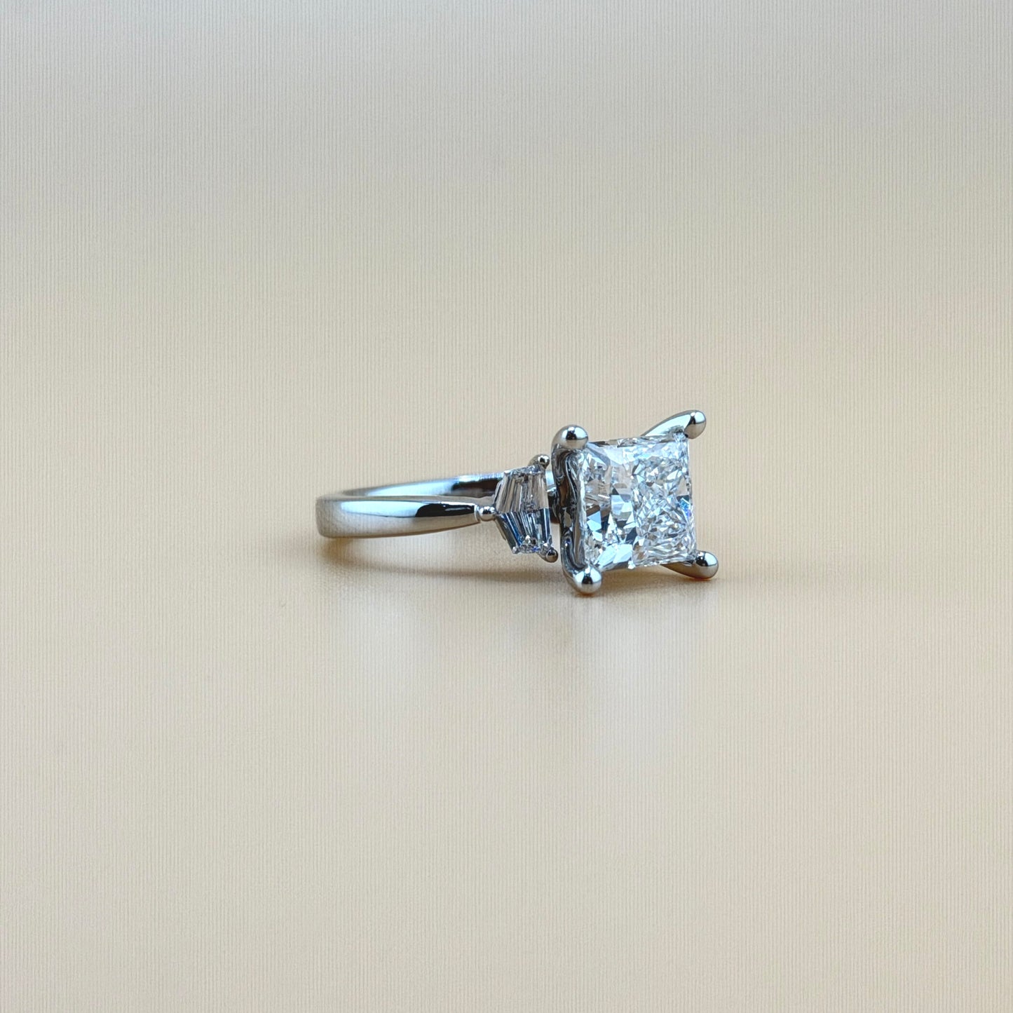 14K White Gold 3.0 CT Princess Cut Three-Stone Ring with 0.5 CT Pentagonal Side Stones – Total 3.5 CTW