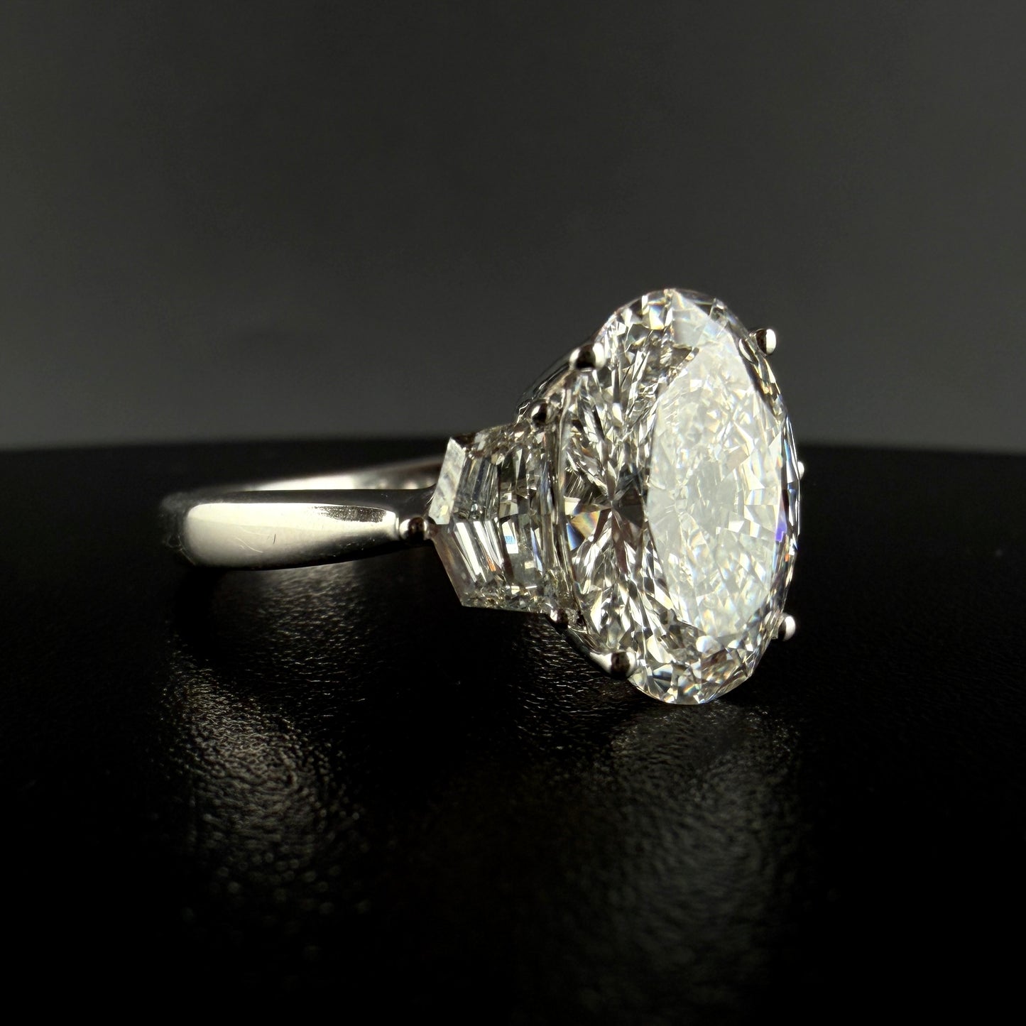3.77 Carat Lab Gown Diamond Engagement ring with 3 CTW Oval center