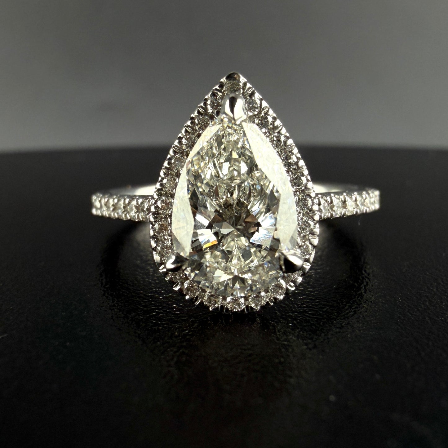 1.25 carats Pear center 1.75 carats diamonds 14k gold Engagement RIng