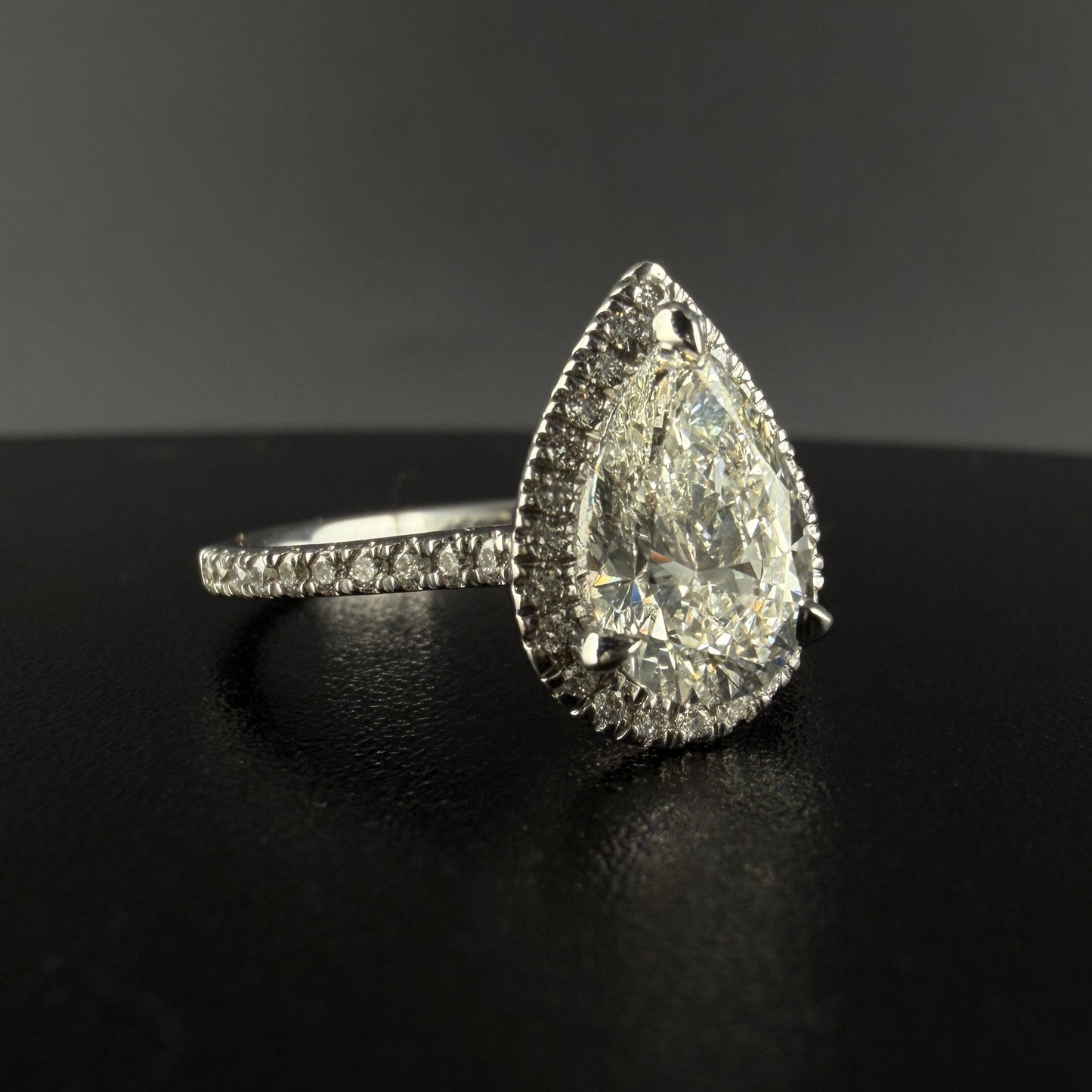 1.25 carats Pear center 1.75 carats diamonds 14k gold Engagement RIng